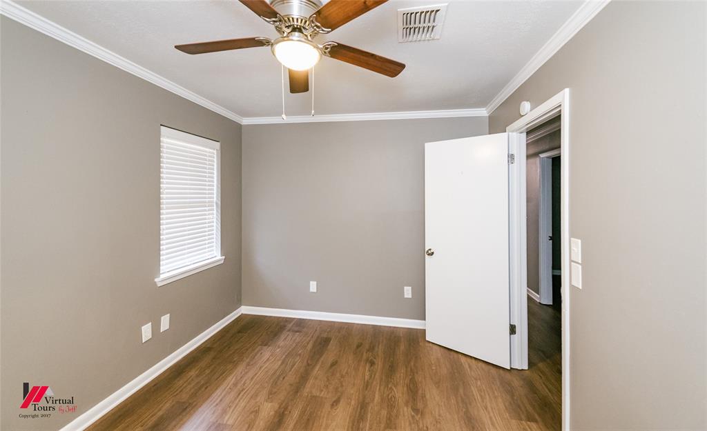 198 7 Pines Road Benton, LA 71006 - Photo 22 of 30 wooden floor in an empty room with a window
