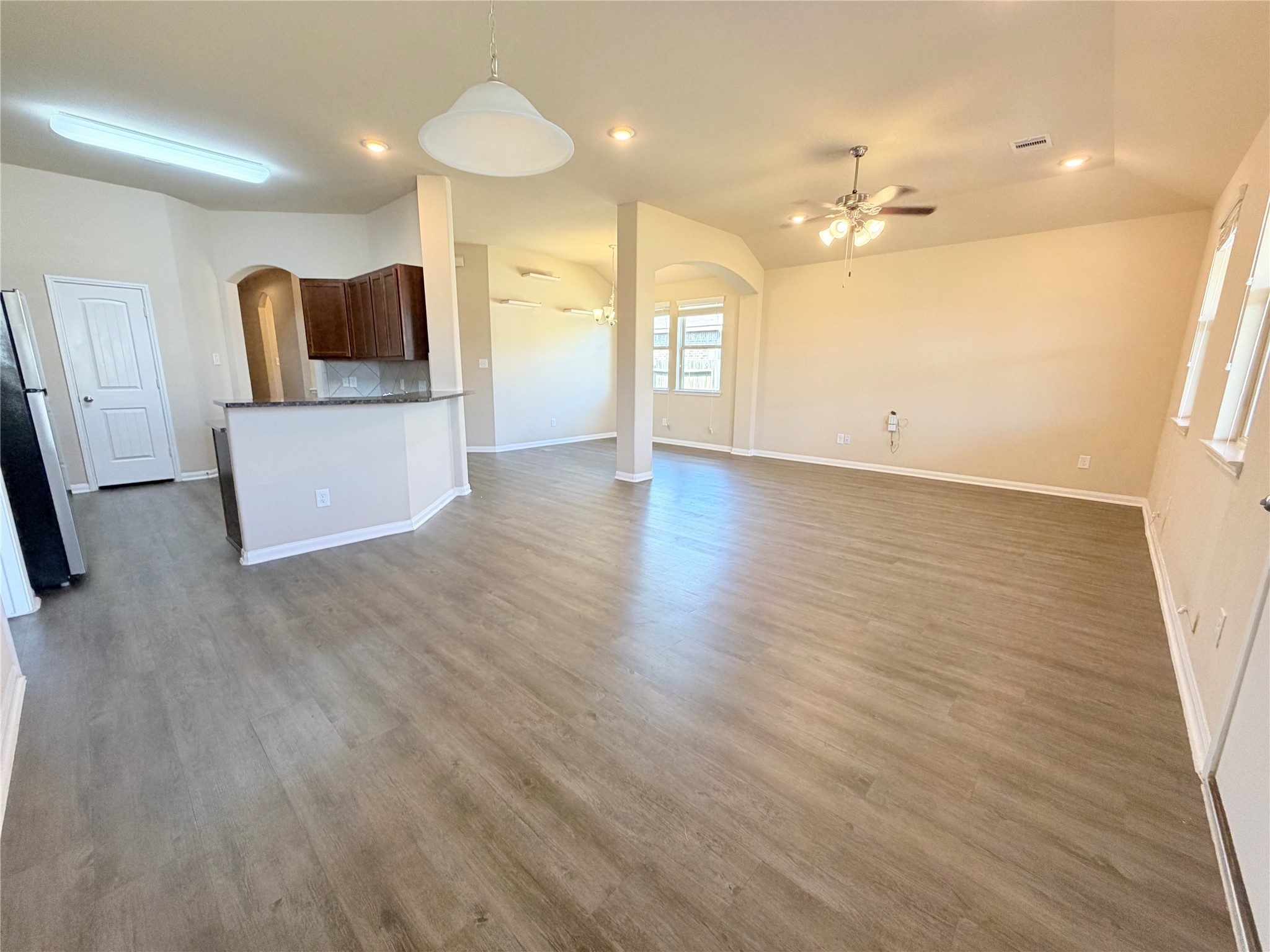 15613 All Star Drive Splendora, TX 77372 - Photo 7 of 25 a view of a kitchen cabinets and wooden floor