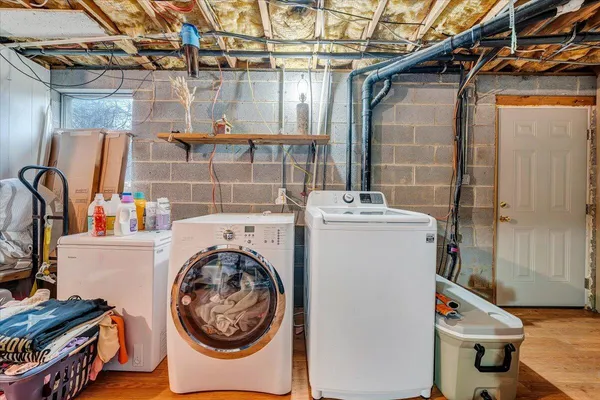 a utility room with dryer and washer
