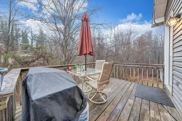 a view of balcony with furniture