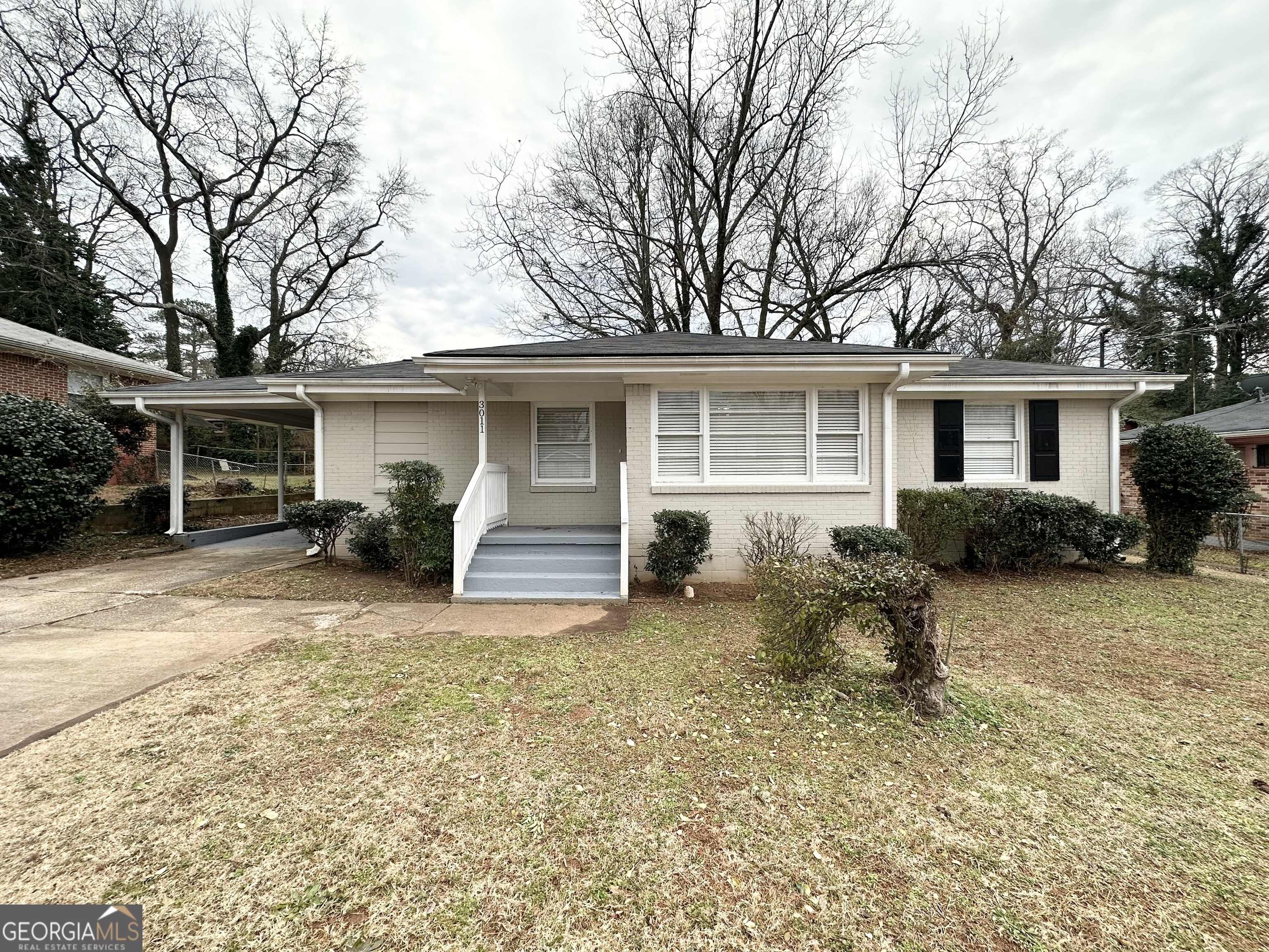 3011 Belvedere Lane Decatur, GA 30032 - Photo 2 of 13 a view of a house with backyard and chairs