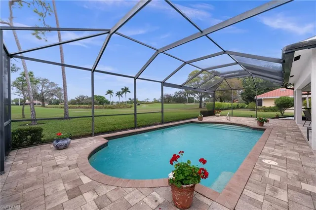 a view of a backyard with potted plants