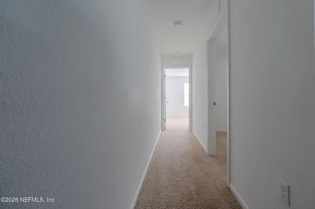 a view of a room with an empty space