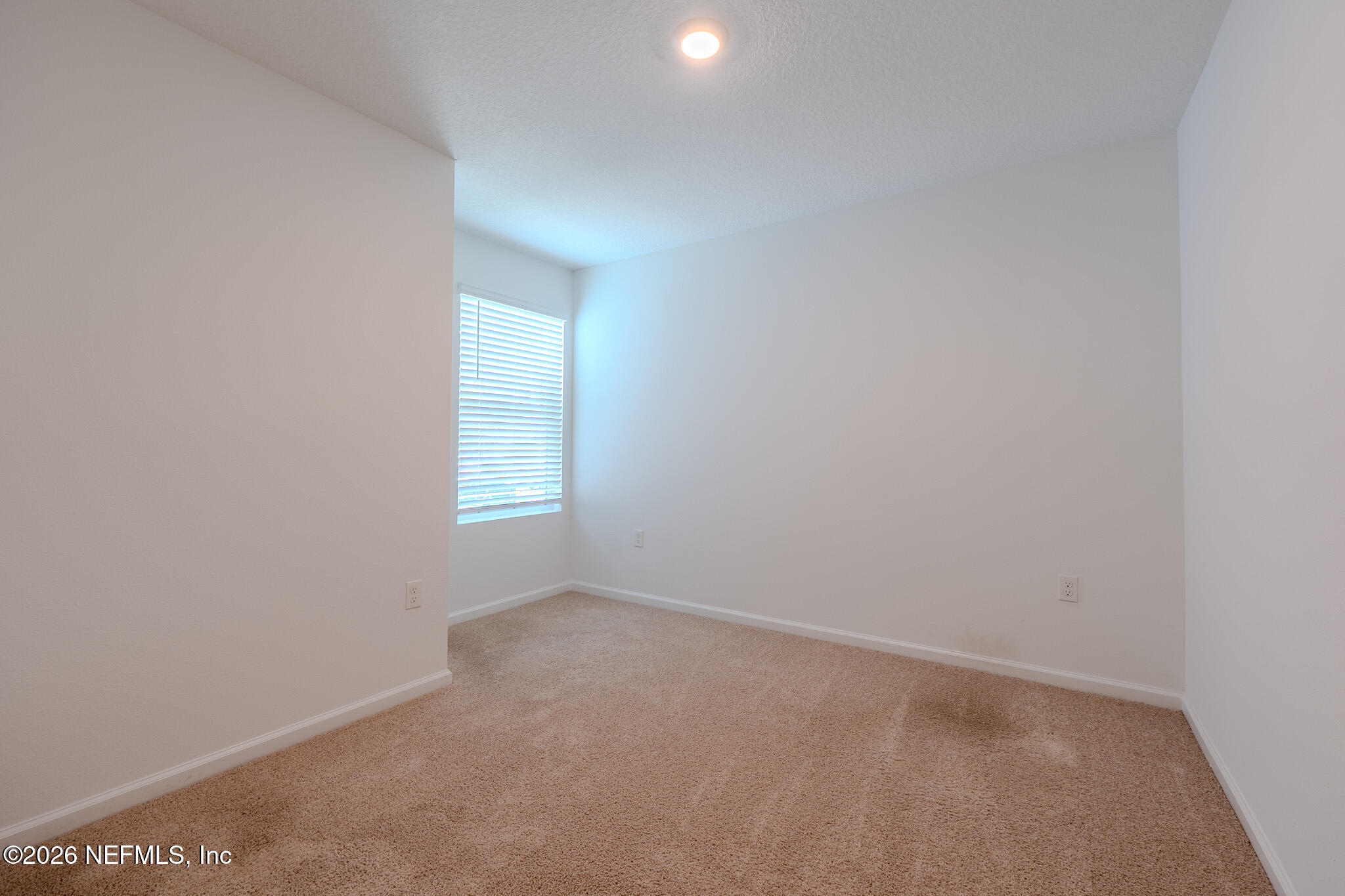 244 Elmhurst Lane St. Augustine, FL 32084 - Photo 18 of 19 a view of an empty room with a window