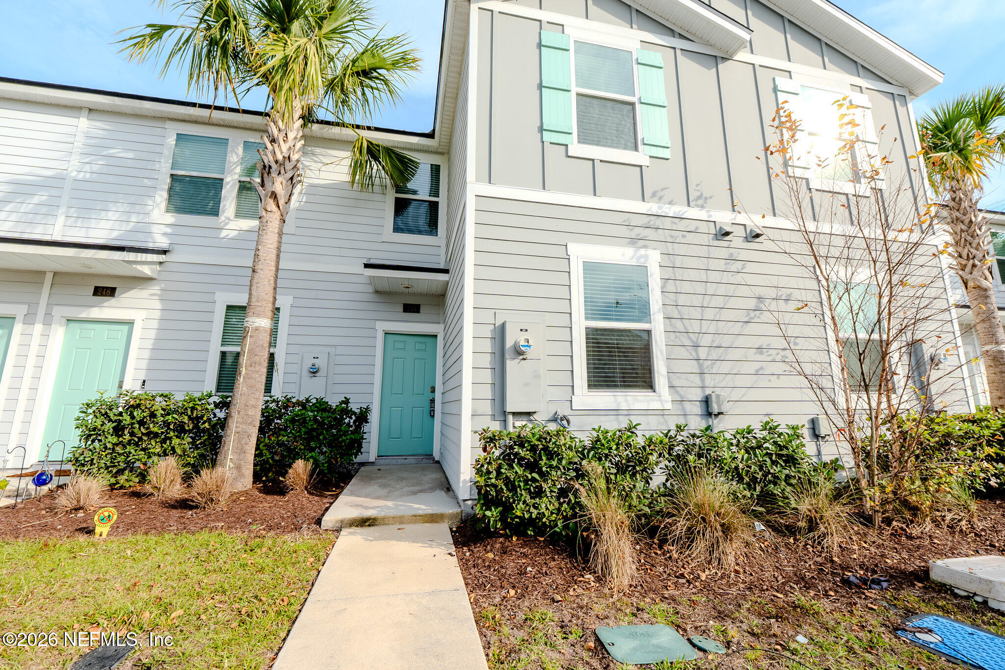 244 Elmhurst Lane St. Augustine, FL 32084 - Photo 2 of 19 a view of a house with potted plants