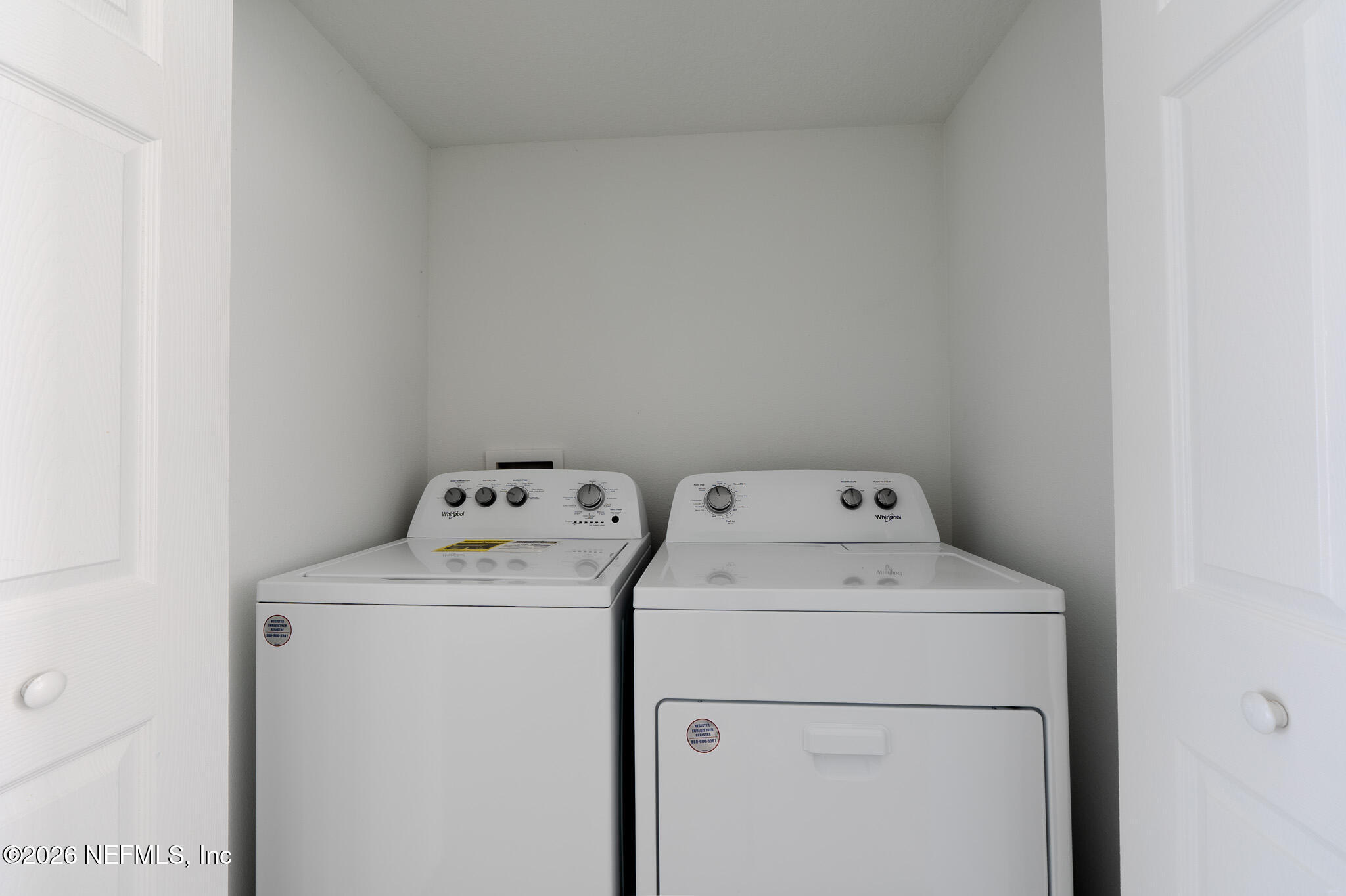 244 Elmhurst Lane St. Augustine, FL 32084 - Photo 8 of 19 a utility room with dryer and washer