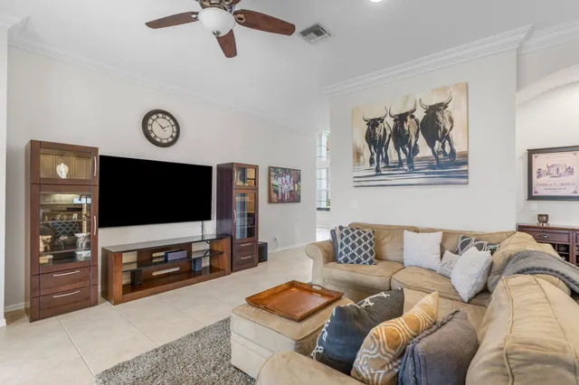a kitchen with granite countertop a sink stove and cabinets