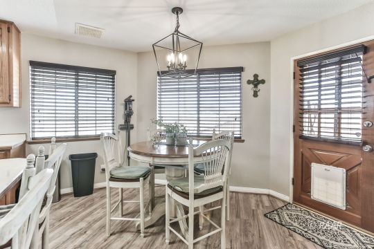 340 North Kern Street Ridgecrest, CA 93555 - Photo 13 of 33 a dining room with furniture and window