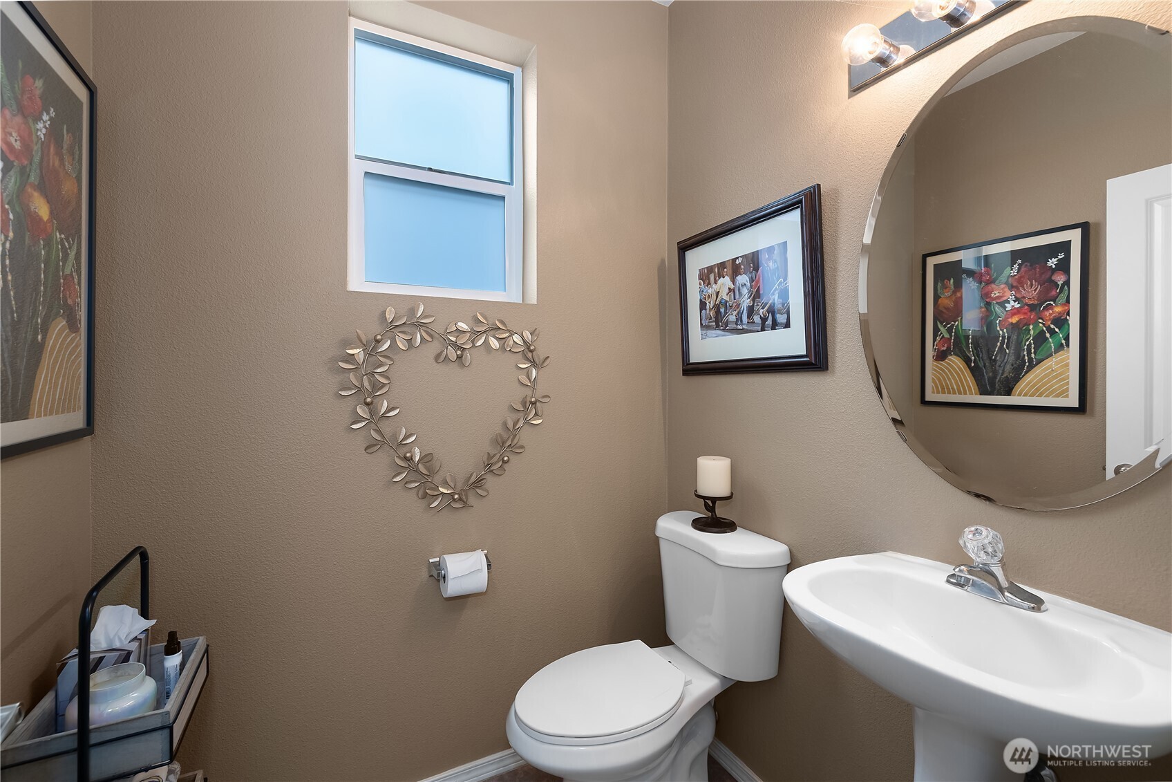 3526 Becket Street Northeast Lacey, WA 98516 - Photo 16 of 32 a bathroom with a toilet a sink and mirror