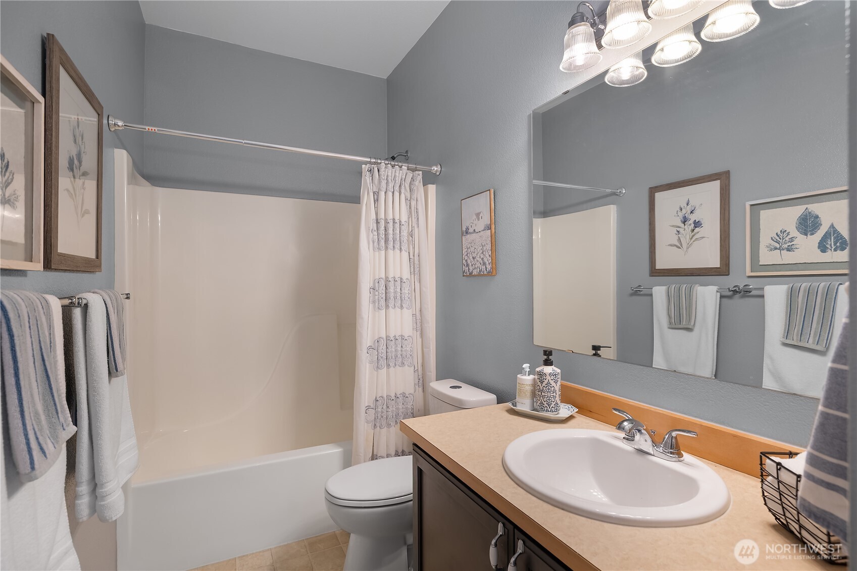 3526 Becket Street Northeast Lacey, WA 98516 - Photo 22 of 32 a bathroom with a sink toilet and shower