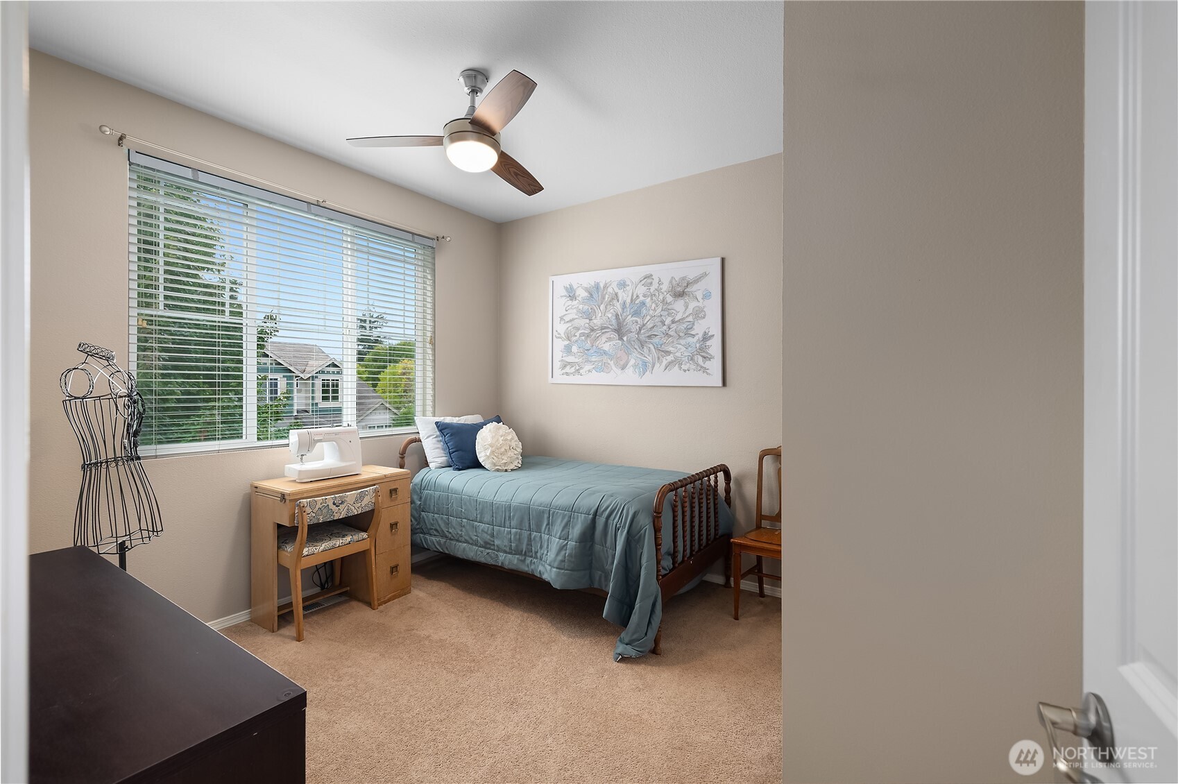 3526 Becket Street Northeast Lacey, WA 98516 - Photo 24 of 32 a living room with a bed furniture a desk and a window