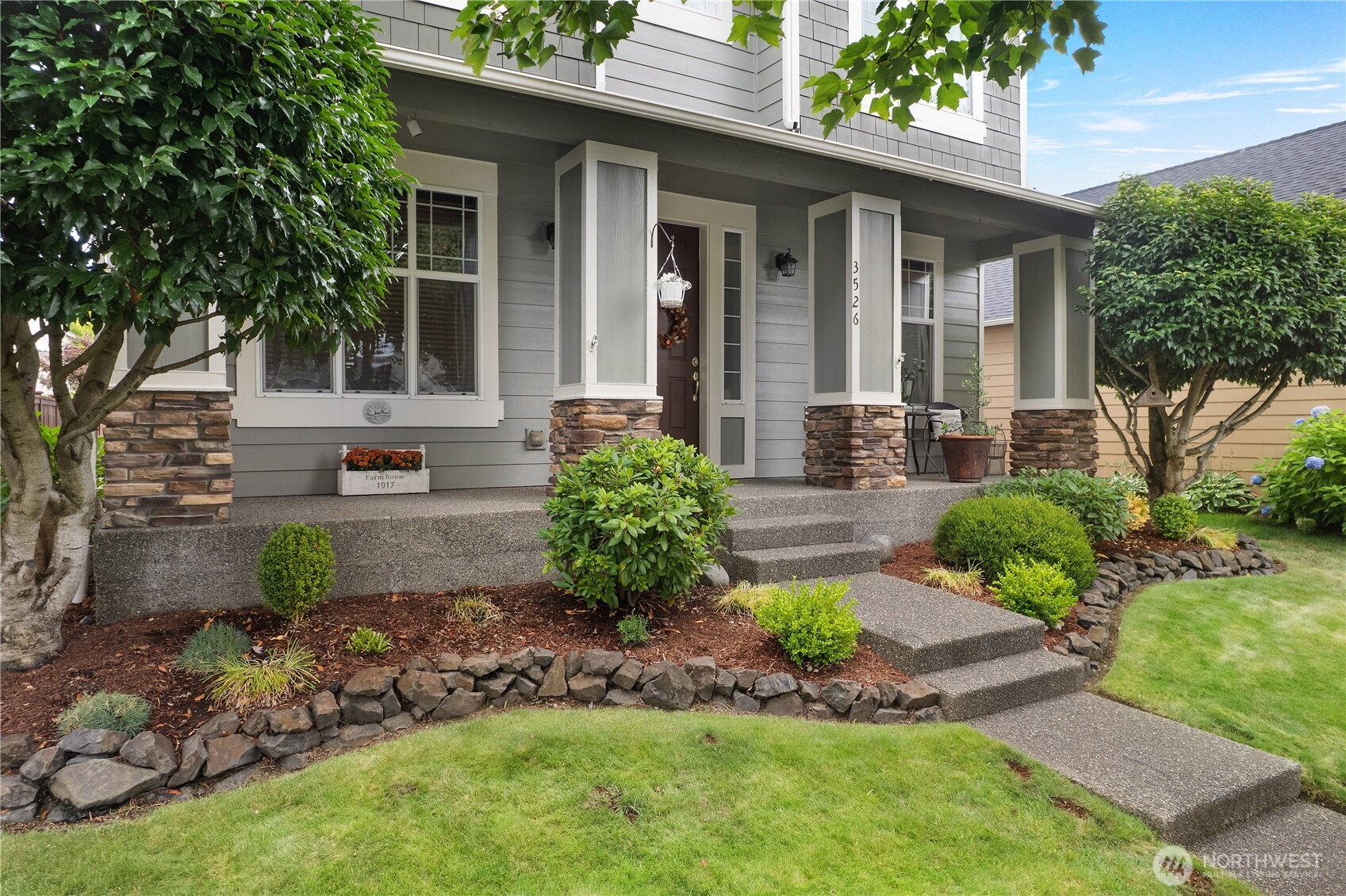 3526 Becket Street Northeast Lacey, WA 98516 - Photo 4 of 32 a front view of a house with garden