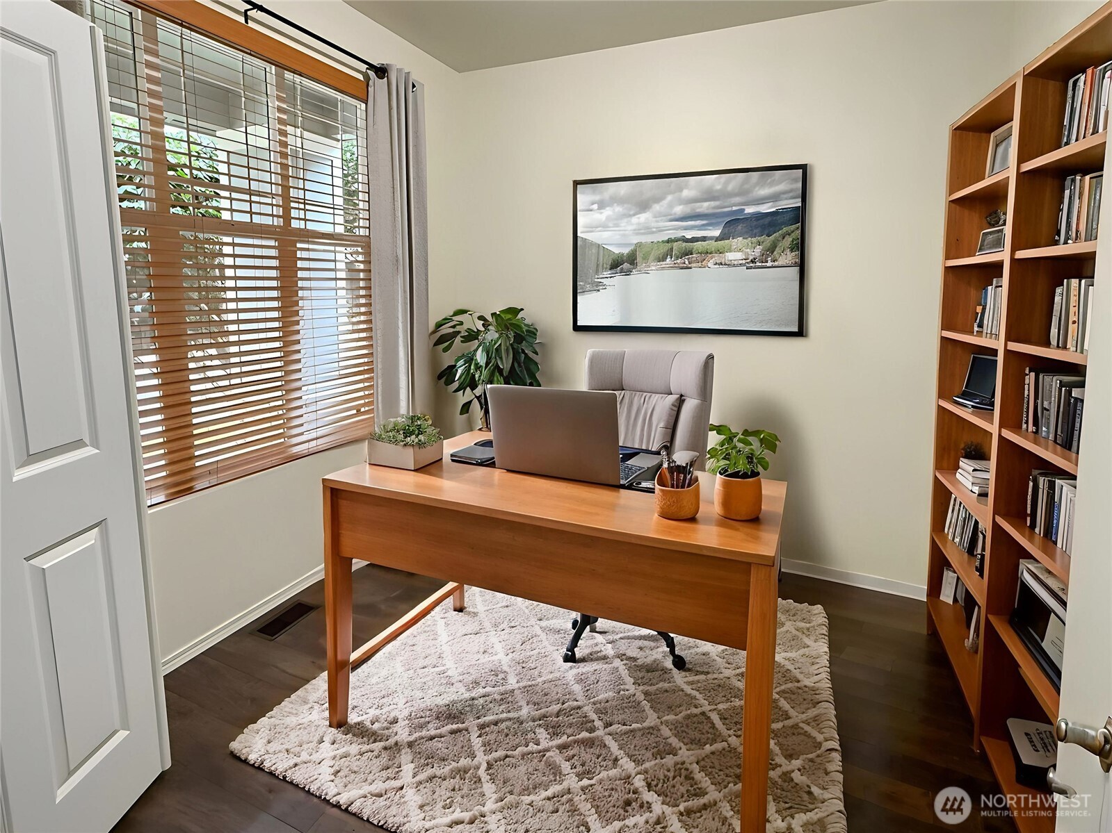 3526 Becket Street Northeast Lacey, WA 98516 - Photo 6 of 32 a room with bookshelf and a table in it