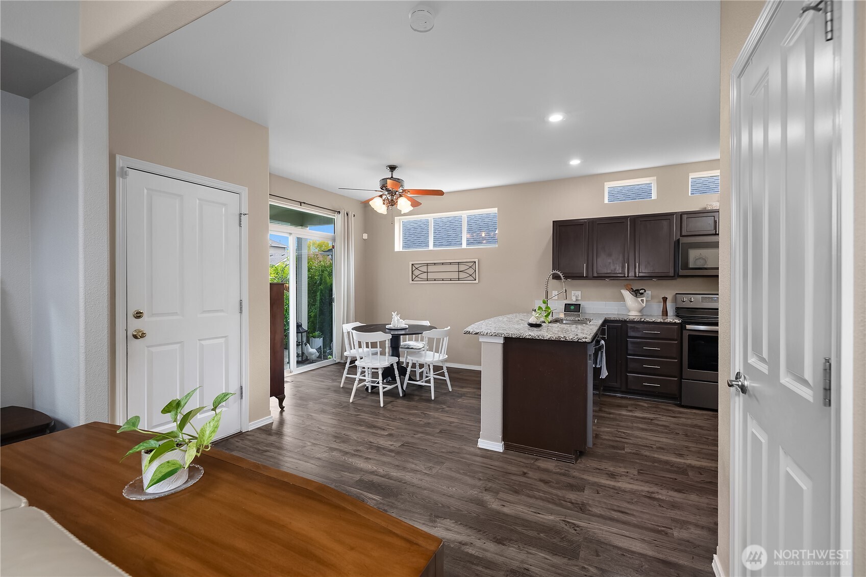 3526 Becket Street Northeast Lacey, WA 98516 - Photo 10 of 32 a kitchen with a table and chairs in it