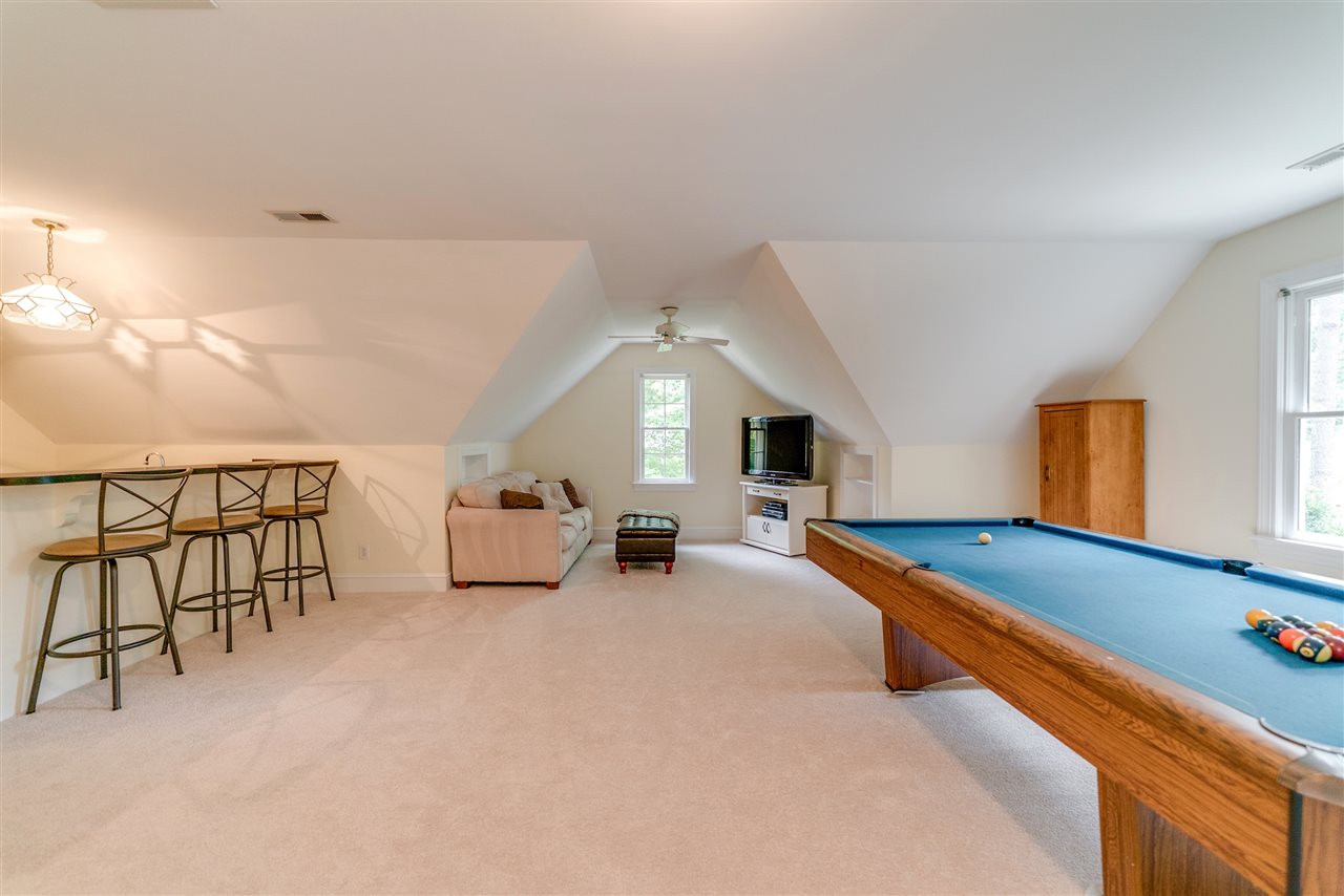 9301 Foxburrow Court Raleigh, NC 27613 - Photo 20 of 25 WOW! The possibilities are endless with a room this size! Lounge area, billiards, bar and still space for a reading nook or library! Bonus Room