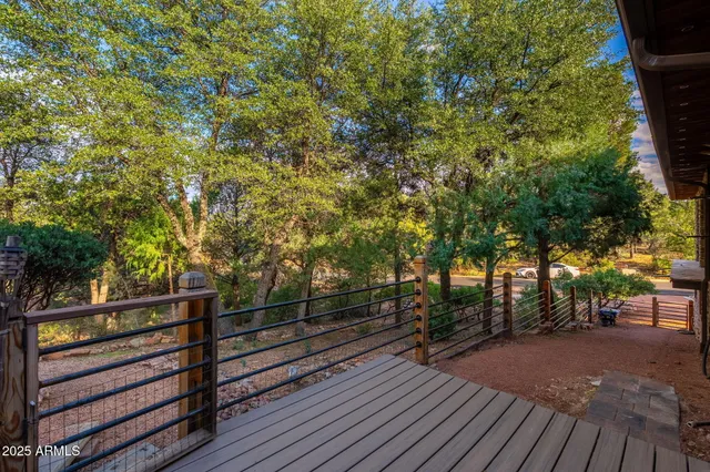 an aerial view of a house with a yard and a garage