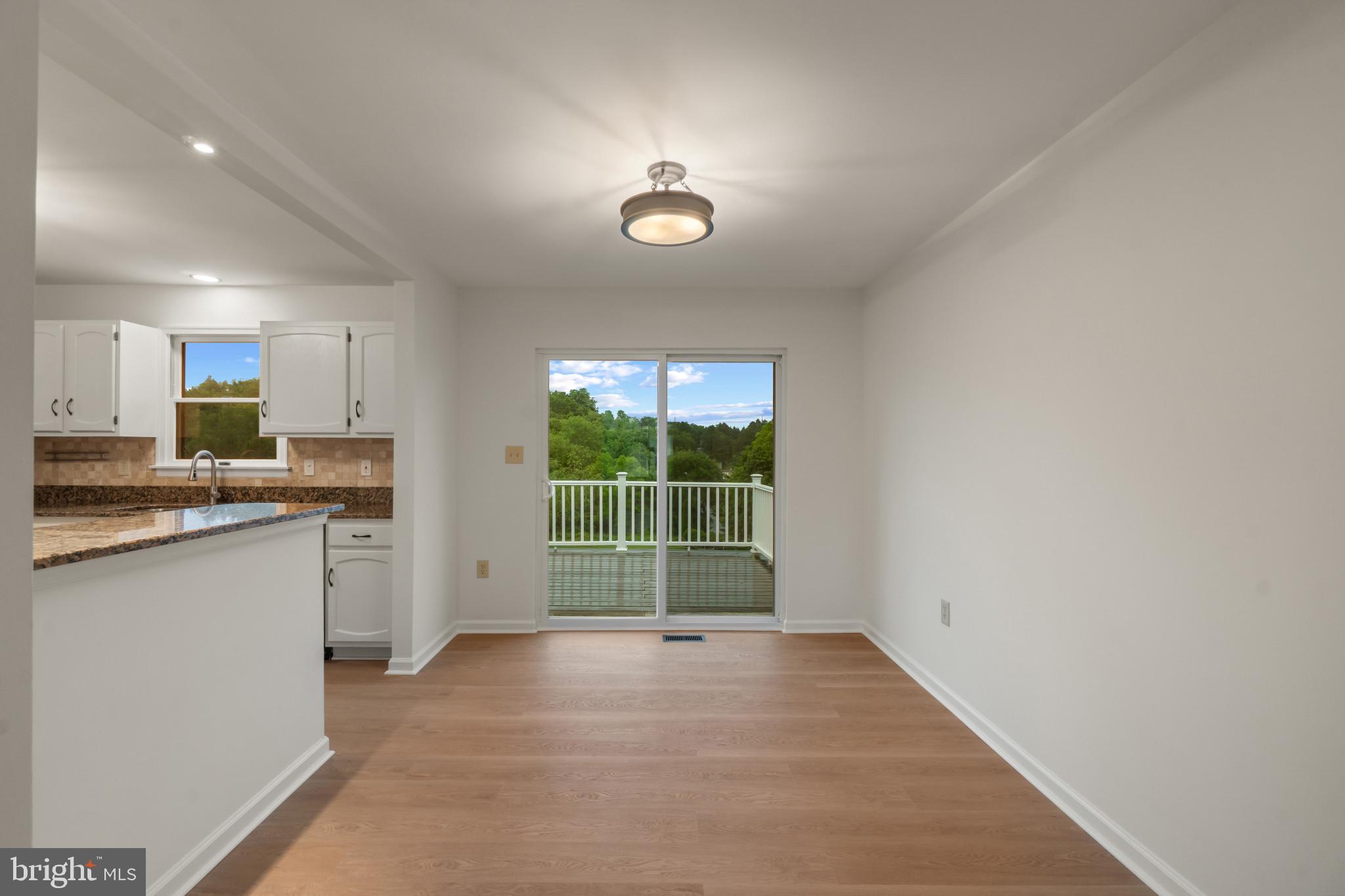 2217 Ridgemont Drive Finksburg, MD 21048 - Photo 11 of 39 Dining room and entrance to the deck