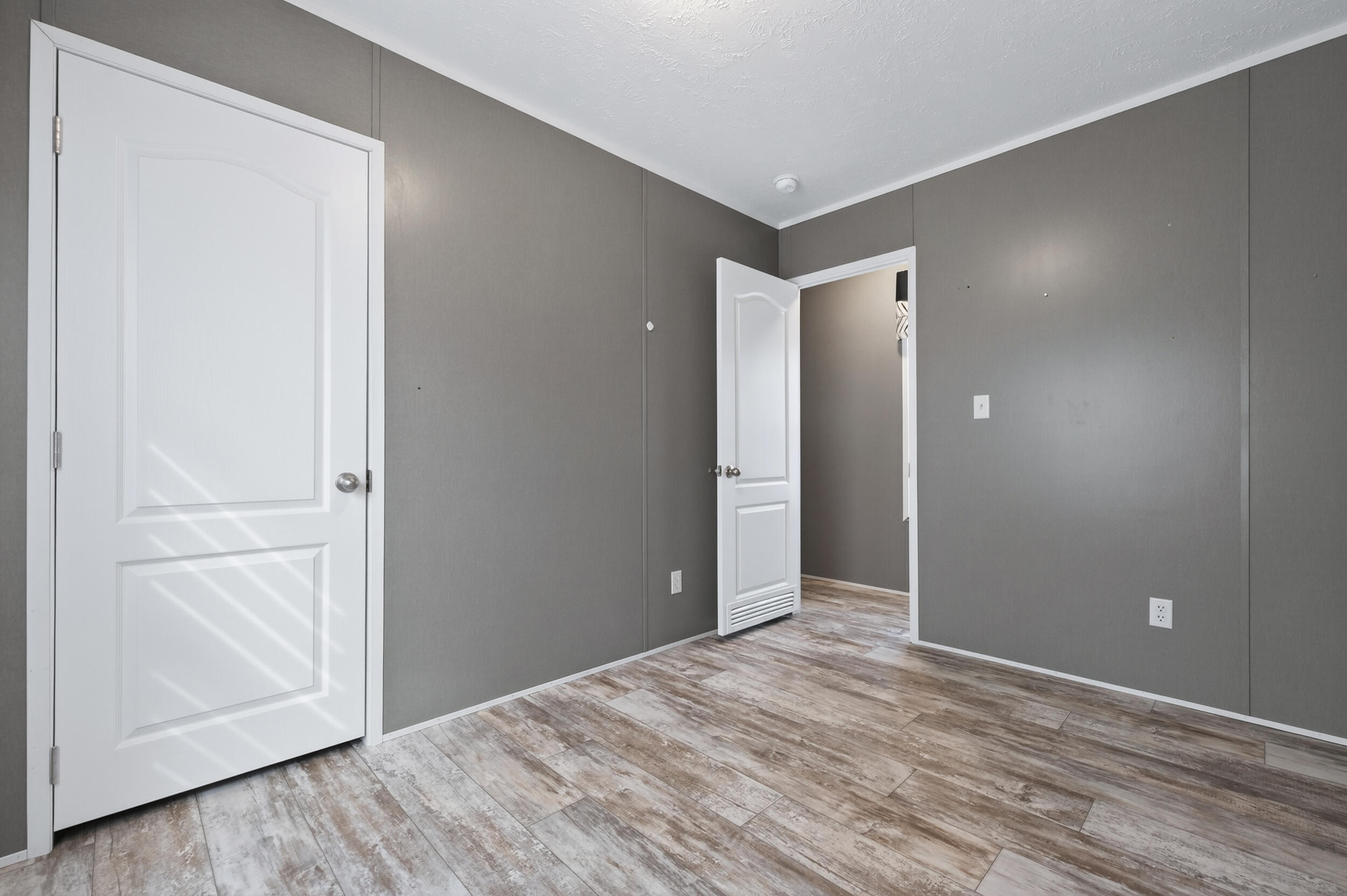 4528 Bryant Bridge Cutoff Road Holt, FL 32564 - Photo 35 of 63 a view of wooden floor