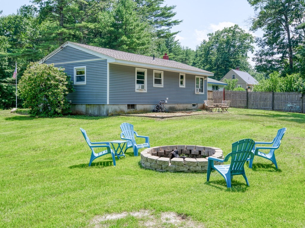 81 Webber Road Brookfield, MA 01506 - Photo 32 of 34 a view of a house with backyard and sitting area