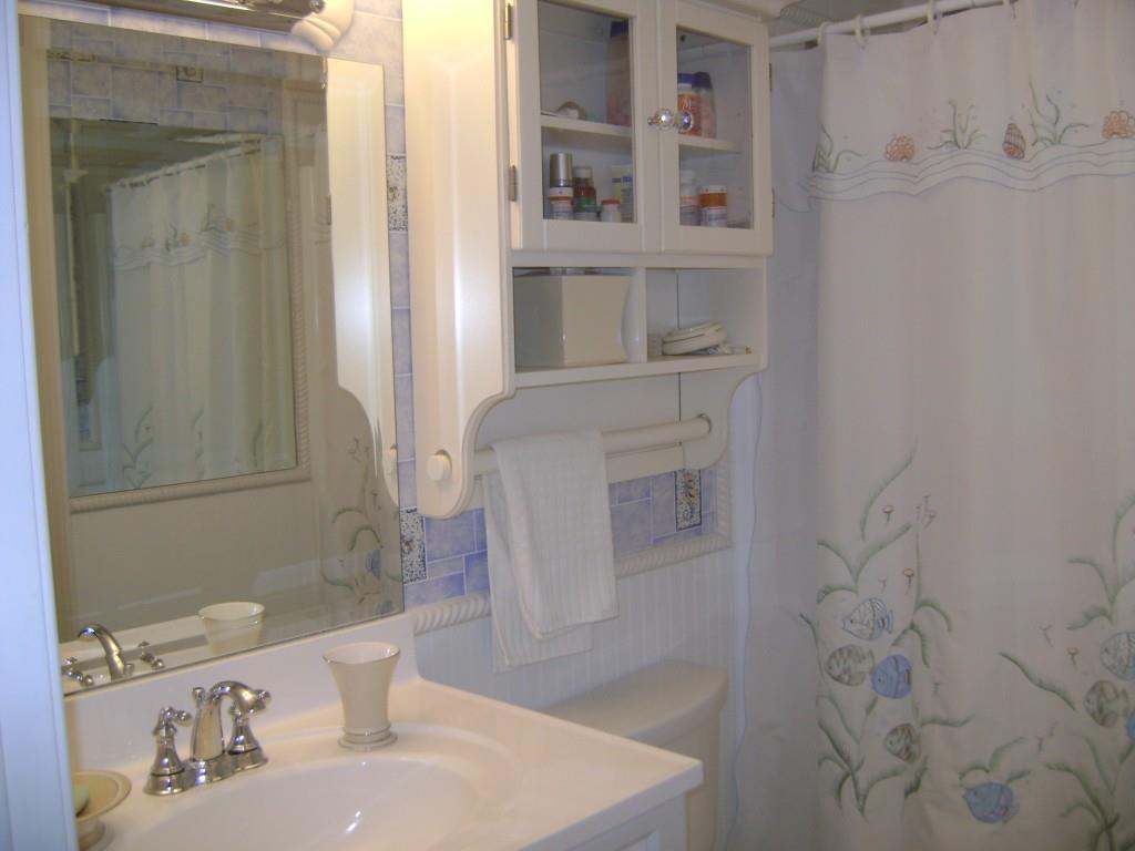 137 Flintlock Village Road, Unit 1 Wells, ME 04090 - Photo 15 of 30 First floor bathroom offers tile...