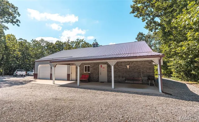 $932,000 | 24418 Golden Beach Road, Barnett, MO 65011