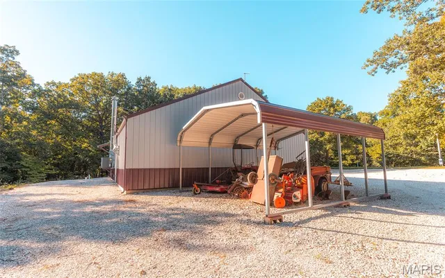 $932,000 | 24418 Golden Beach Road, Barnett, MO 65011