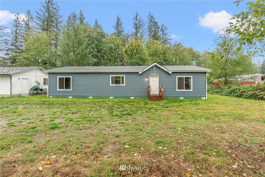 40822 Dorman Road Gold Bar, WA 98251 - Photo 2 of 34 a view of a house with backyard and garden
