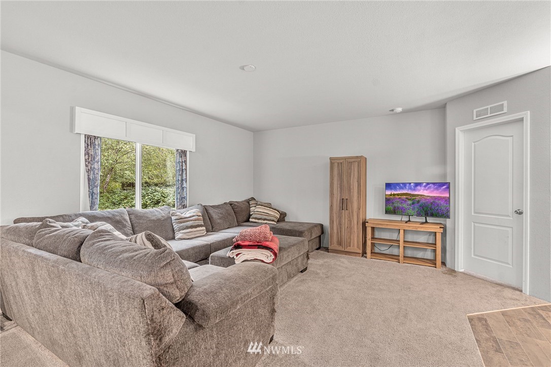 40822 Dorman Road Gold Bar, WA 98251 - Photo 16 of 34 a bedroom with furniture and a window