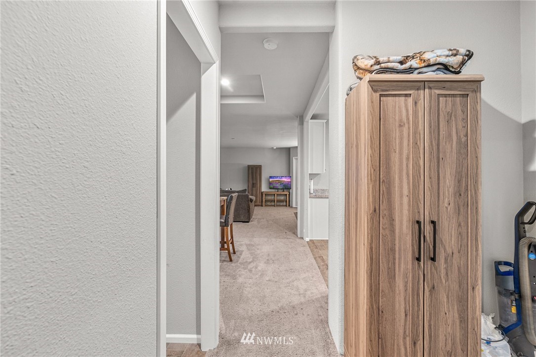 40822 Dorman Road Gold Bar, WA 98251 - Photo 20 of 34 a view of a hallway with closet and a livingroom view