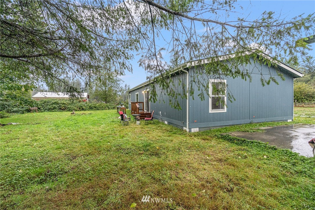 40822 Dorman Road Gold Bar, WA 98251 - Photo 26 of 34 a house with garden in front of it