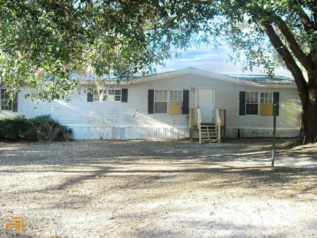 504 East Williams Street Rincon, GA 31326 - Photo 1 of 1 a view of a house with a patio