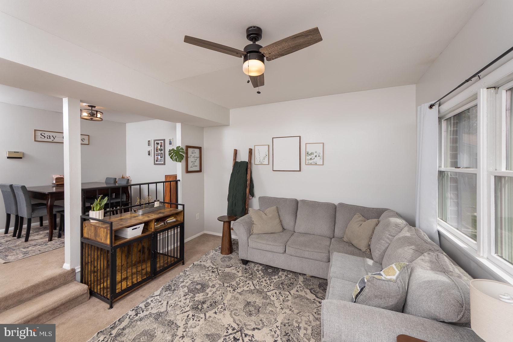 706 Riley Court Westminster, MD 21158 - Photo 30 of 61 Sun drenched living room with modern ceiling fan.