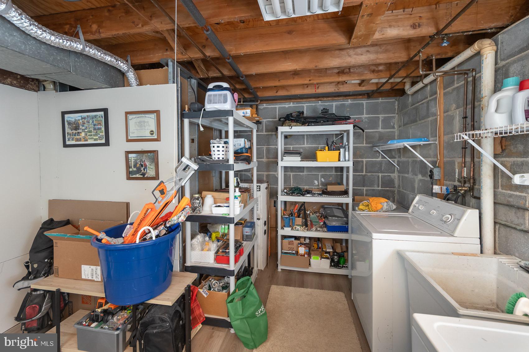 706 Riley Court Westminster, MD 21158 - Photo 59 of 61 Entire Utility Room has LVP Flooring.