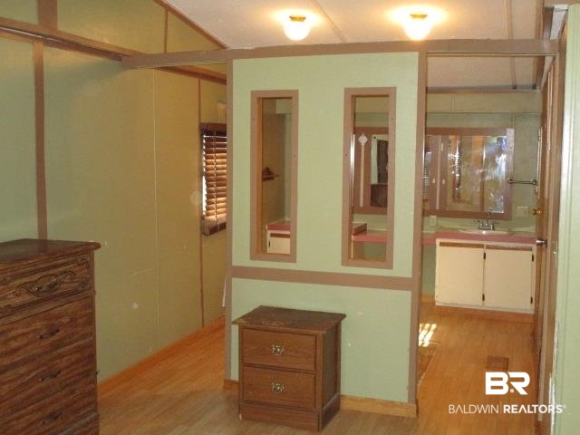 20705 Greek Cemetery Road Robertsdale, AL 36567 - Photo 13 of 25 Hall with light wood finished floors