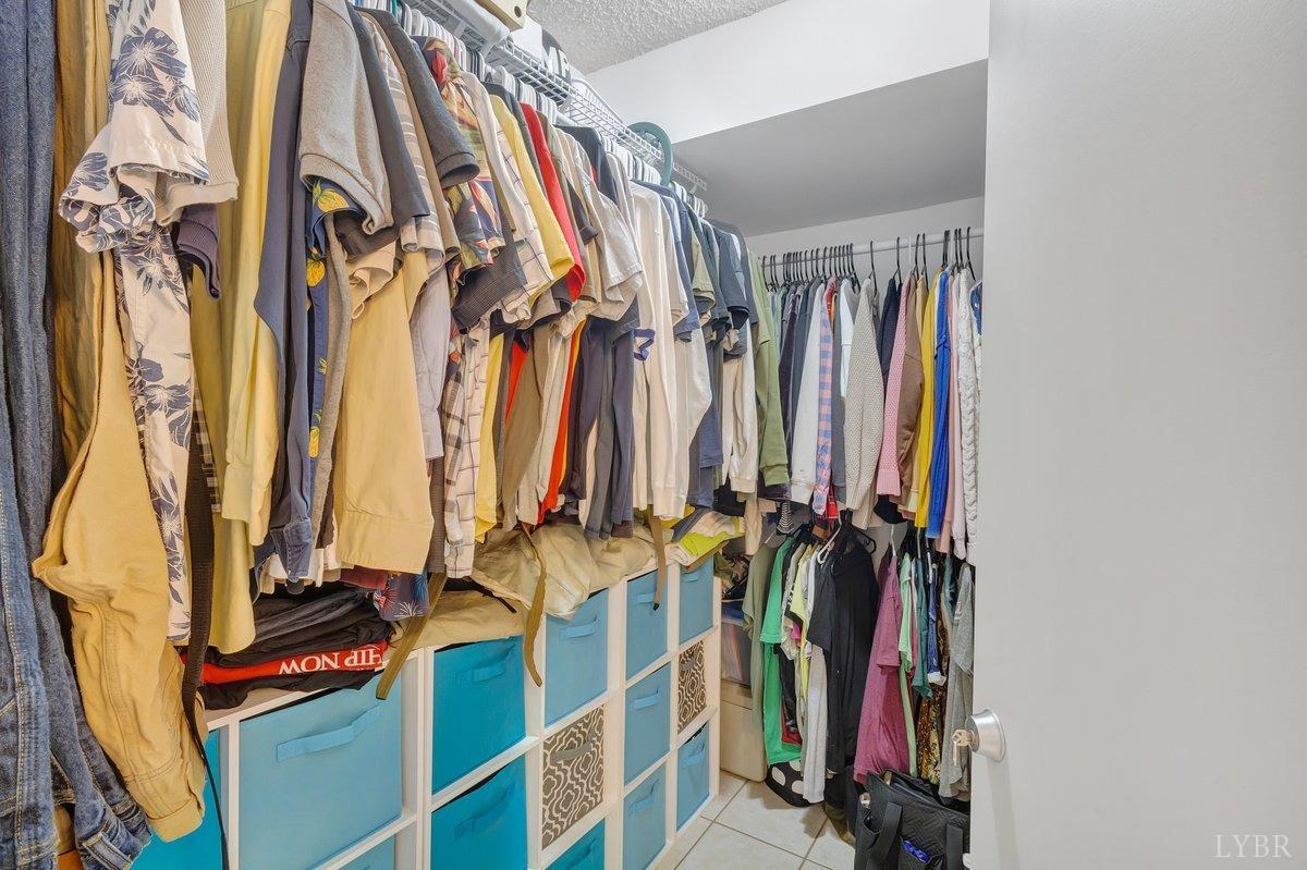 2404 Deer Run Forest, VA 24551 - Photo 21 of 32 a view of walk in closet with clothes