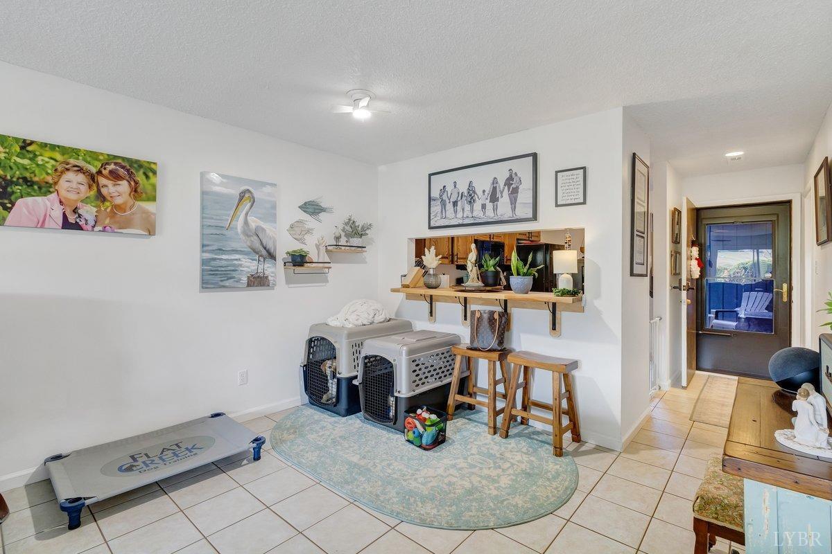2404 Deer Run Forest, VA 24551 - Photo 9 of 32 a living room with furniture and white walls