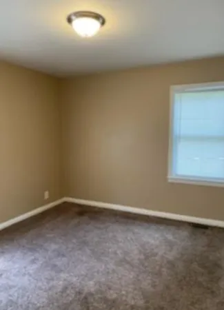 an empty room with a workbench