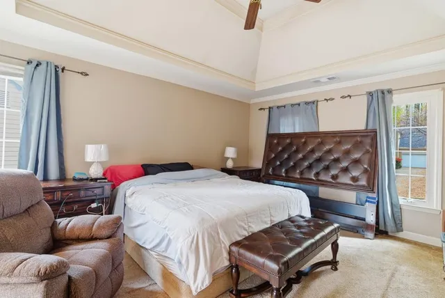 a living room with a couch and a table