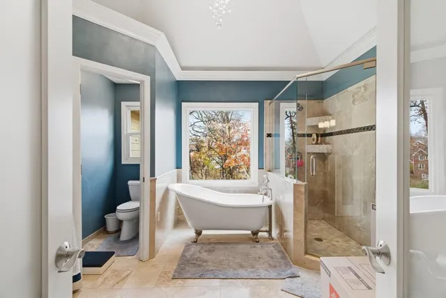 a living room with furniture mirror and a mirror