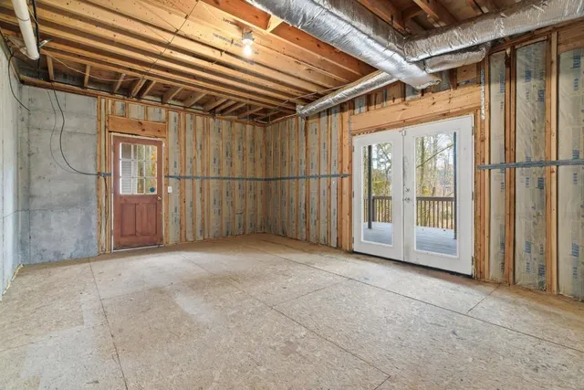 a view of a room with wooden walls