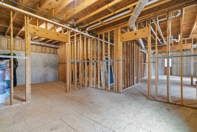 a view of a balcony with wooden floor