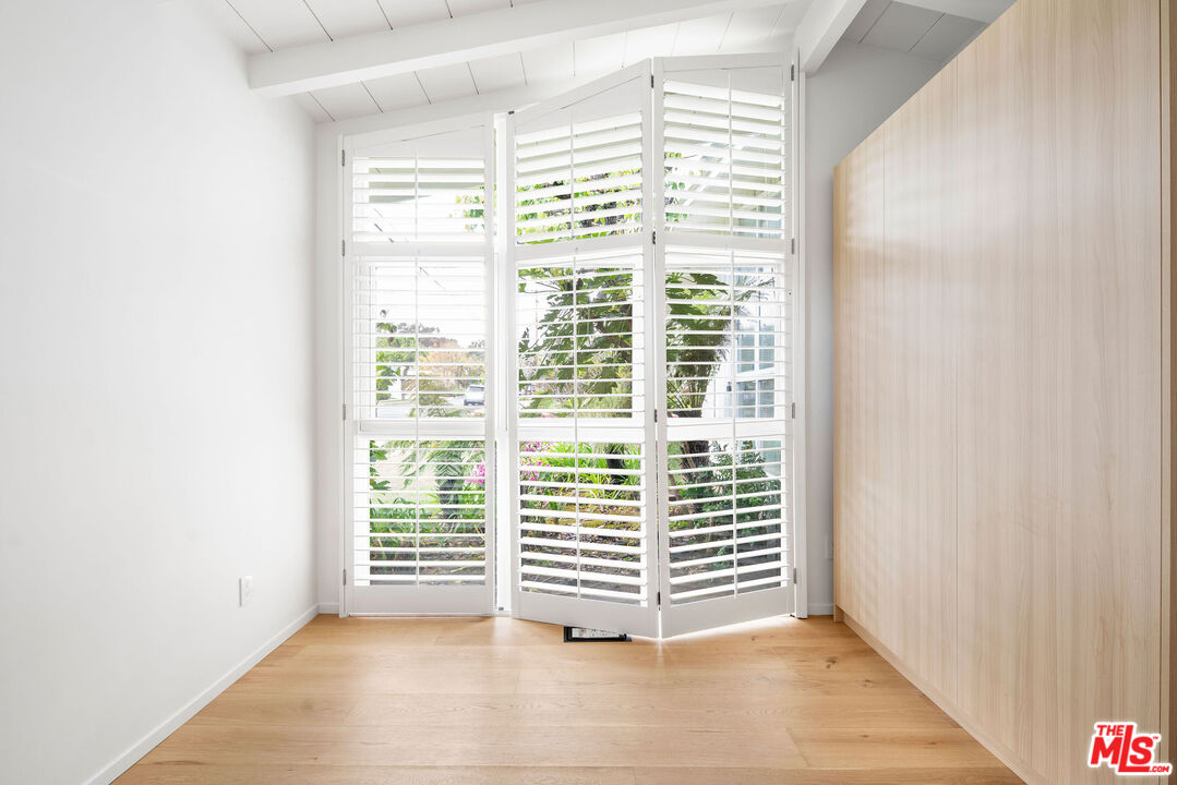 11368 Berwick Street Los Angeles, CA 90049 - Photo 15 of 27 a view of a room with stairs