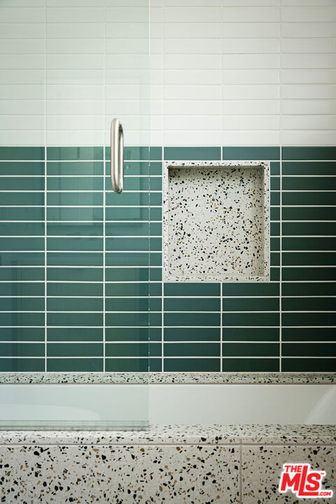 11368 Berwick Street Los Angeles, CA 90049 - Photo 18 of 27 a view of a door with a bench