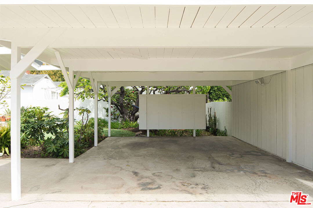 11368 Berwick Street Los Angeles, CA 90049 - Photo 25 of 27 a view of a room with a floor to ceiling window