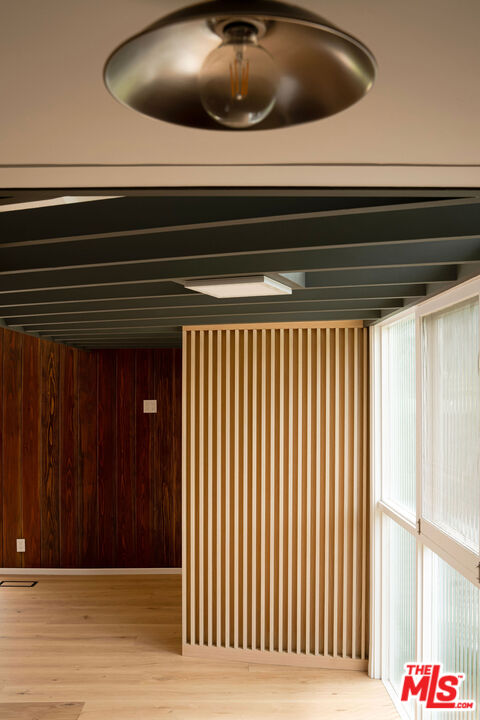 11368 Berwick Street Los Angeles, CA 90049 - Photo 5 of 27 a view of a livingroom and wooden floor