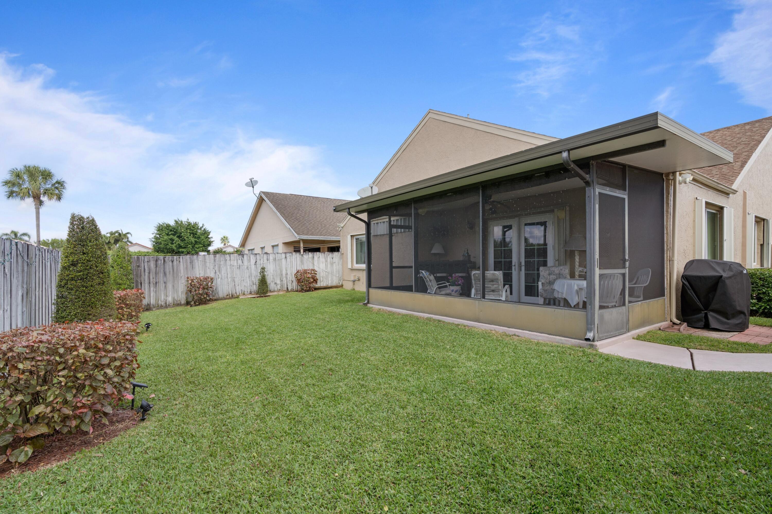 23035 Sunfield Drive Boca Raton, FL 33433 - Photo 3 of 27 Screened Patio