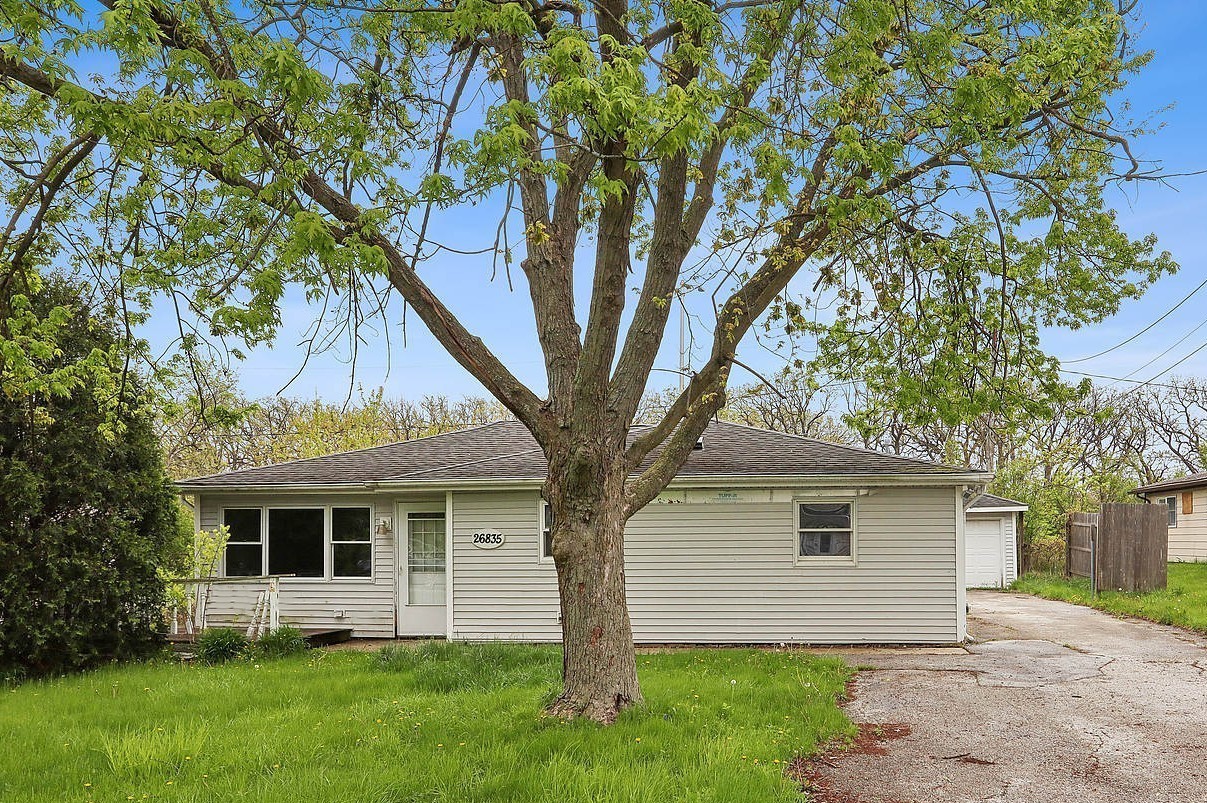 26835 South Linden Lane Crete, IL 60417 - Photo 1 of 13 a front view of house with yard and green space