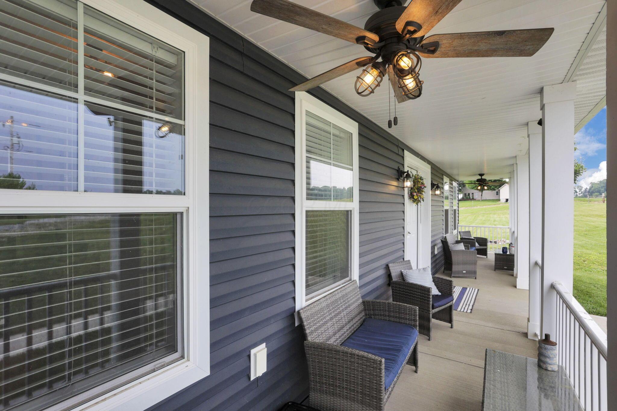 9559 Basil Road Northwest Baltimore, OH 43105 - Photo 5 of 44 Front Porch Left