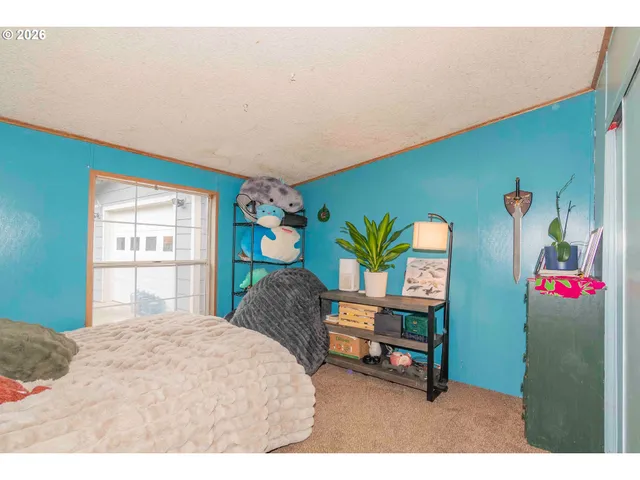 a bathroom with a sink mirror and vanity