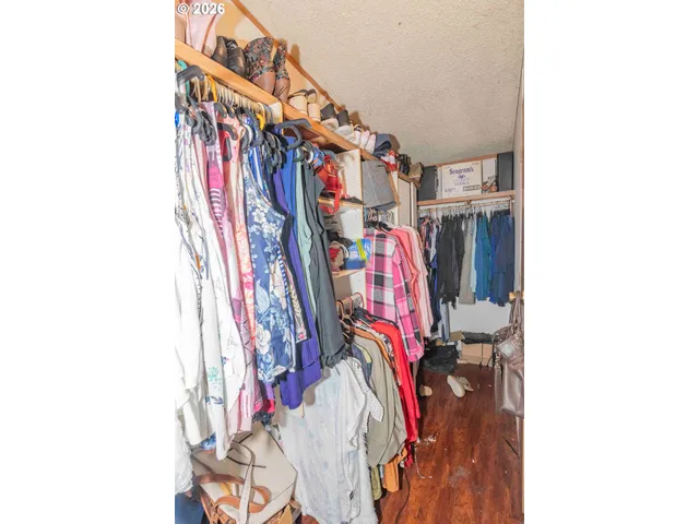 a house view with a sitting space and balcony